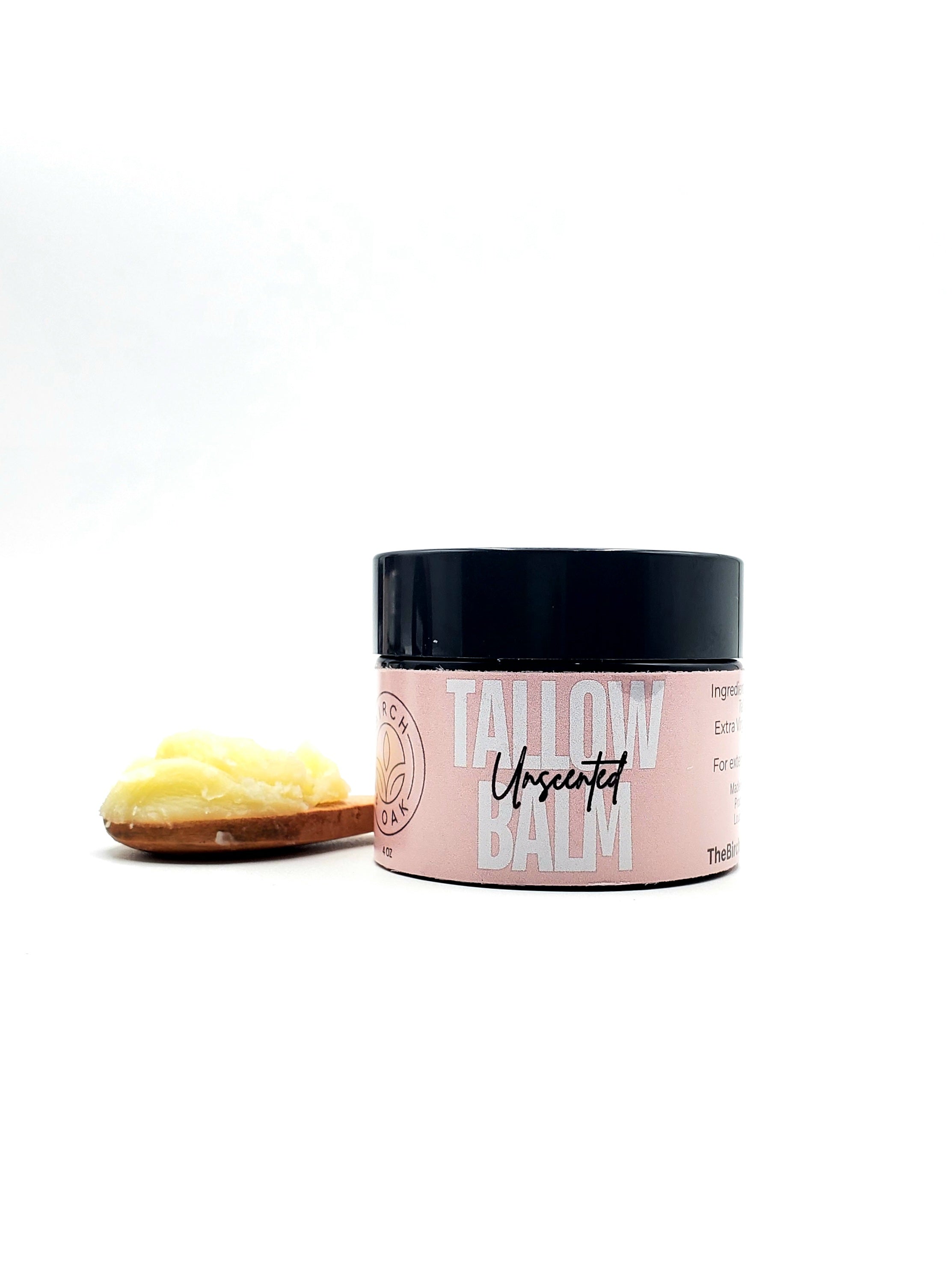 Jar of Tallow Balm with a black lid on a white background